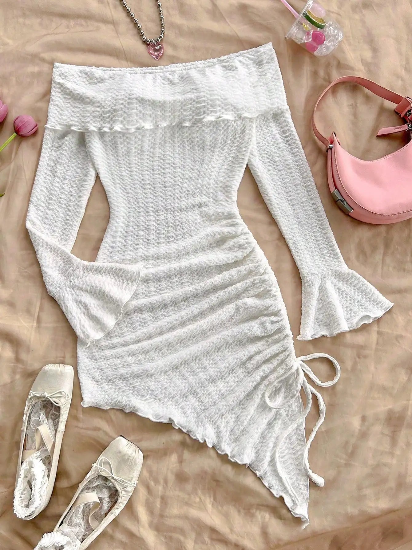Spring and summer new pure horn long-sleeved hollow-out dress with irregular pleats wrapped buttock dress to show leg length