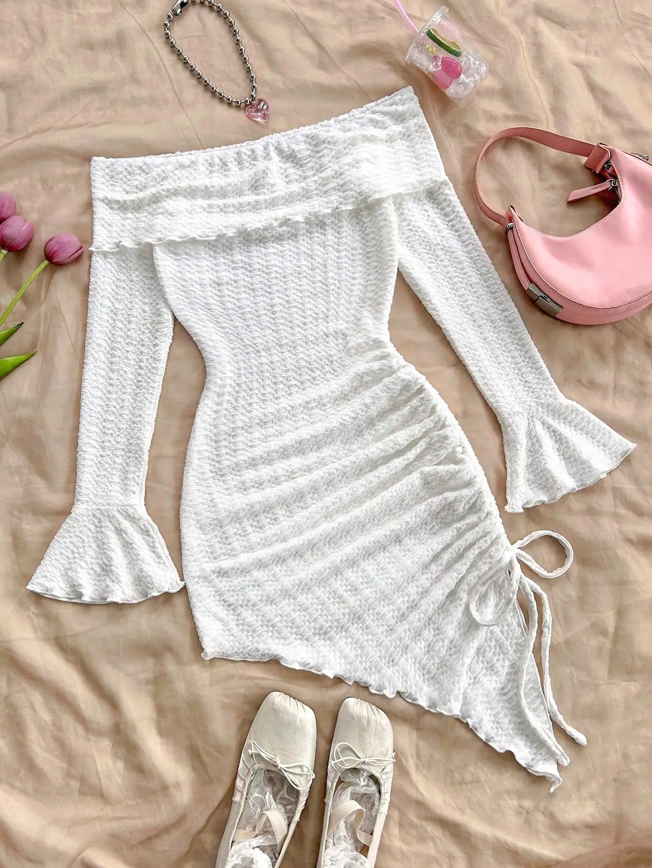 Spring and summer new pure horn long-sleeved hollow-out dress with irregular pleats wrapped buttock dress to show leg length