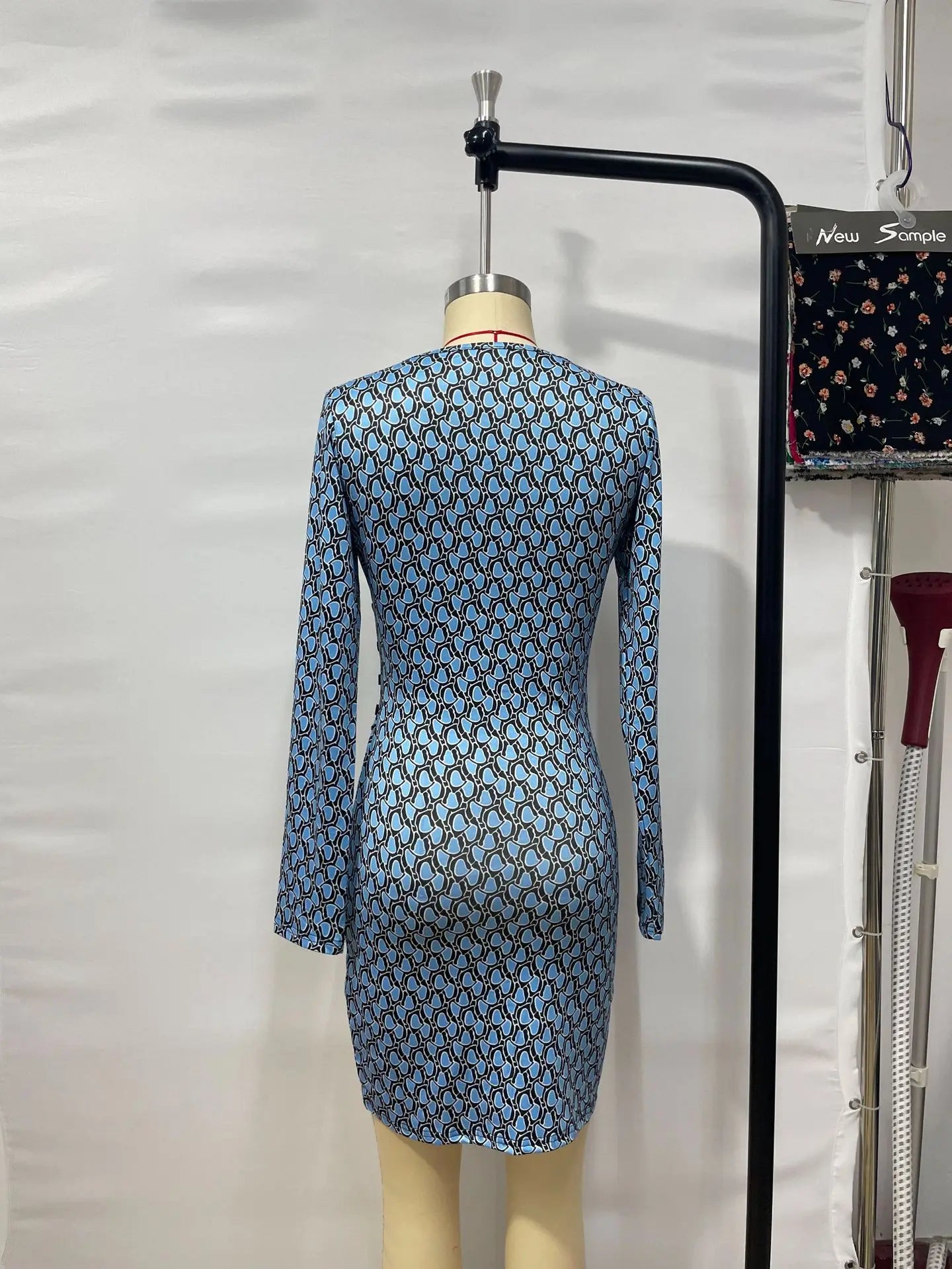 Spring Autumn New Print Dresses Women Sexy Deep V-neck Buttons Folds Irregular Package Hip Dress Fashion Lady Slim Mini Vestidos