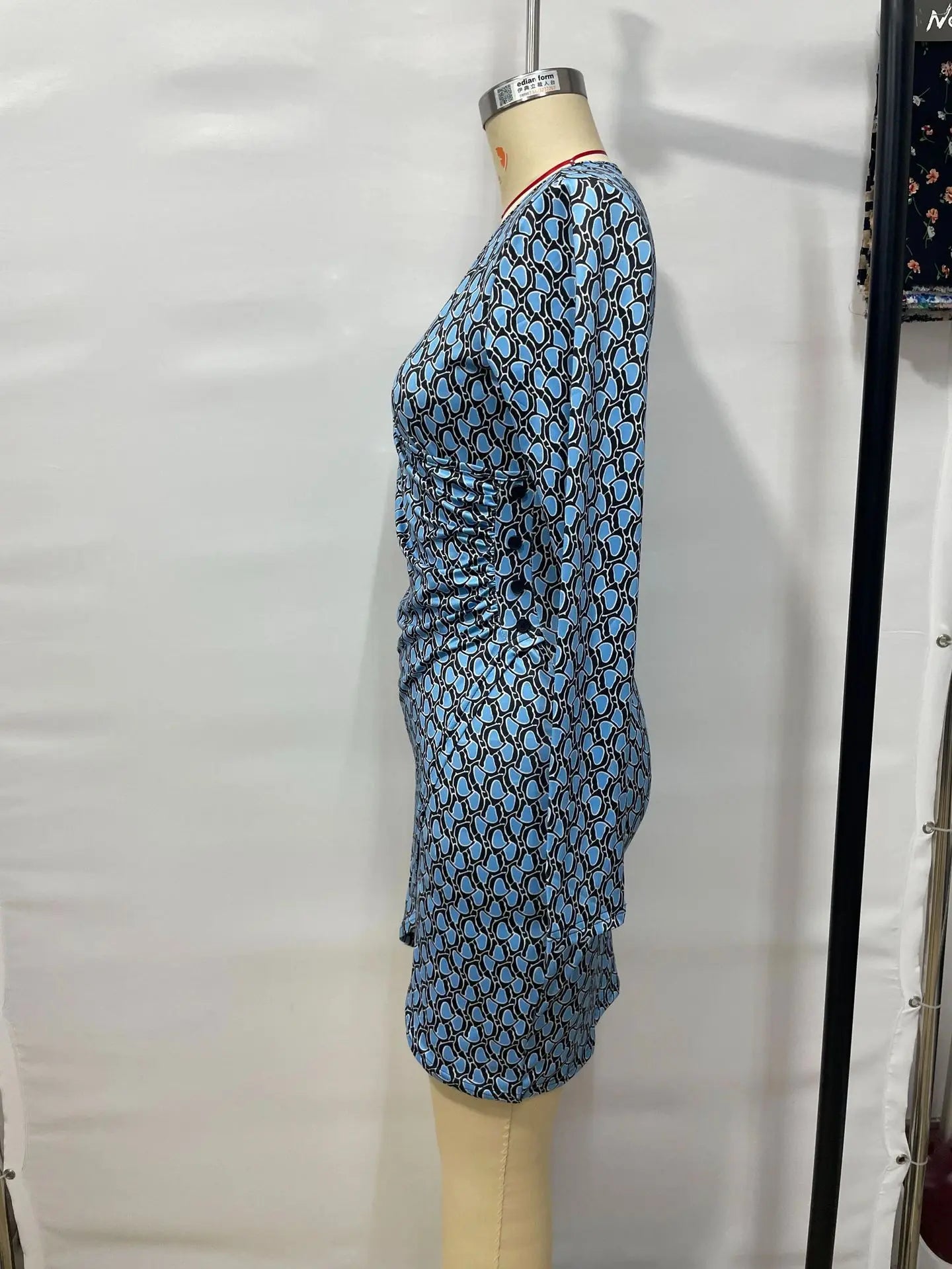 Spring Autumn New Print Dresses Women Sexy Deep V-neck Buttons Folds Irregular Package Hip Dress Fashion Lady Slim Mini Vestidos