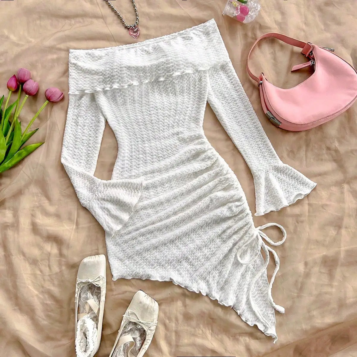 Spring and summer new pure horn long-sleeved hollow-out dress with irregular pleats wrapped buttock dress to show leg length