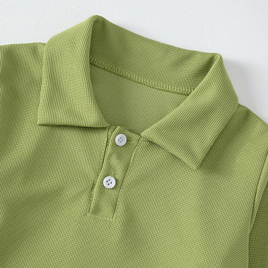 Children's solid color POLO shirt boy handsome fashion sports T-shirt girl lapel casual and comfortable half sleeve.