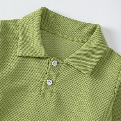 Children's solid color POLO shirt boy handsome fashion sports T-shirt girl lapel casual and comfortable half sleeve.